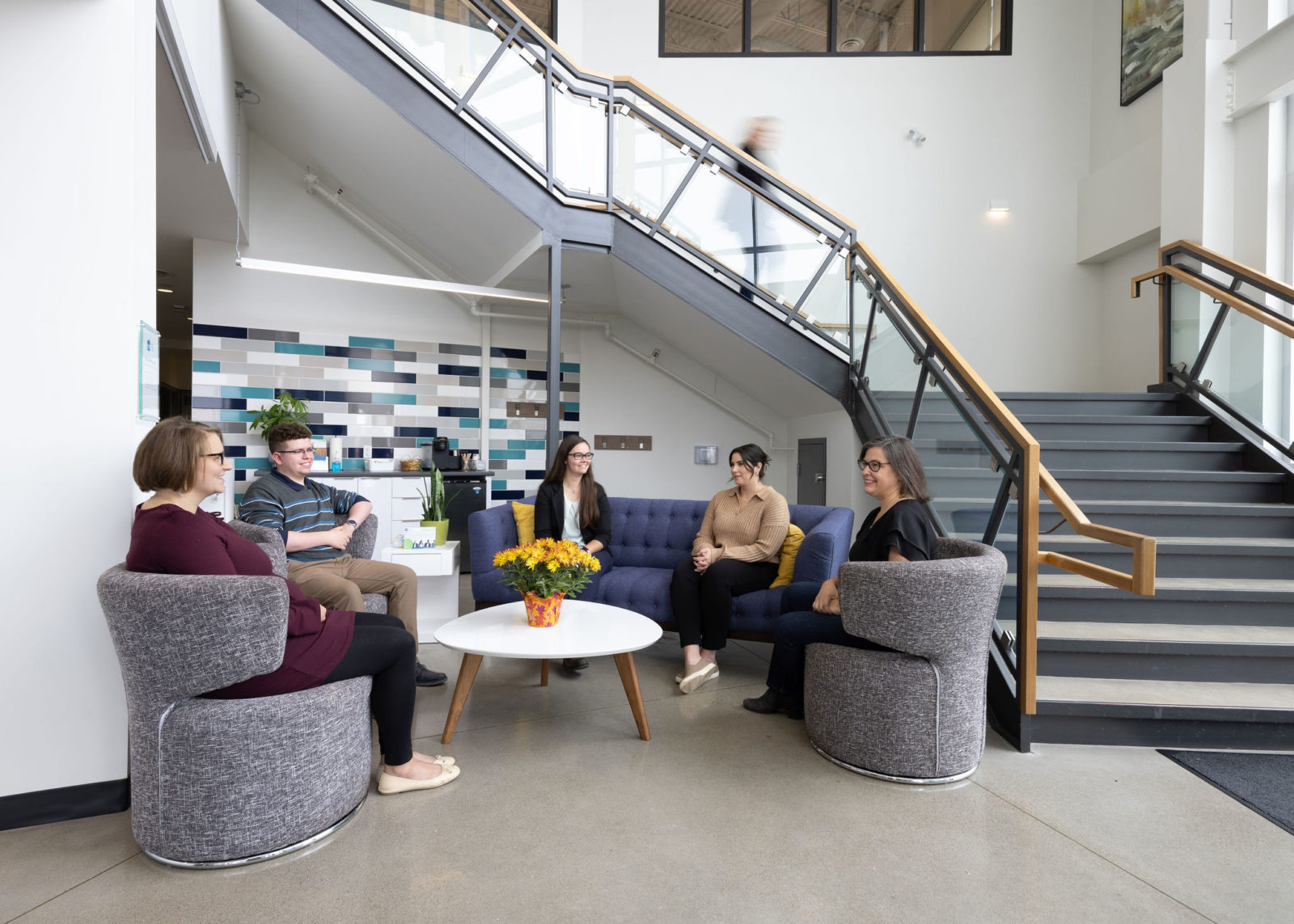 The RLB team sitting in the lobby